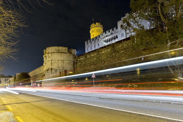 The Buonconsiglio castle in Trento overlooks the city traffic. Trentino Alto-Adige, Italy, Europe.