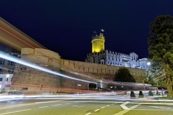 The Buonconsiglio castle, one of the symbols of Trento, overlooks the city traffic. Trentino Alto-Adige, Italy, Europe.