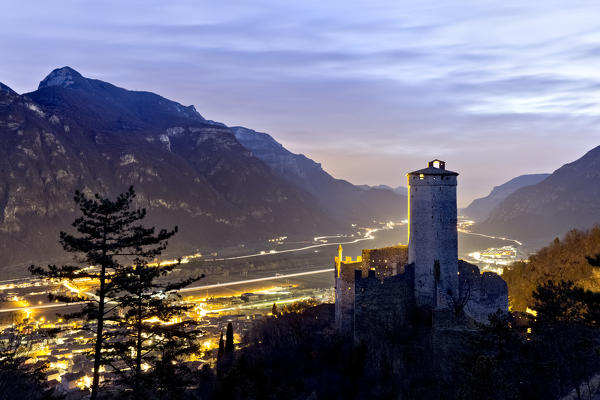 Night falls at the medieval castle of Avio. Trento province, Trentino Alto-Adige, Italy, Europe.