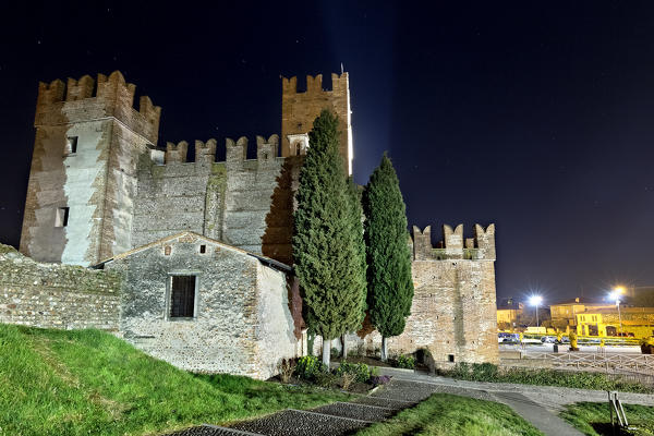 Night at the Scaligero castle of Villafranca di Verona. Verona province, Veneto, Italy, Europe.