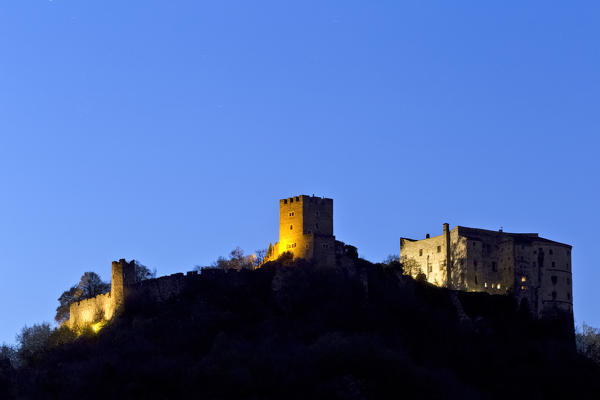 Night falls at the medieval castle of Pergine. Valsugana, Trento province, Trentino Alto-Adige, Italy, Europe.
