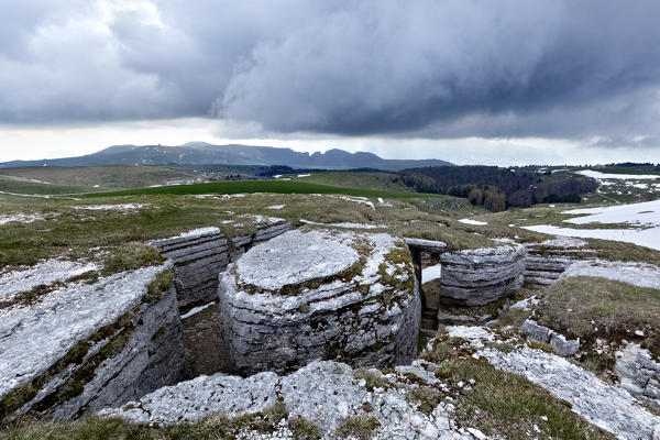 Trenches of the Great War army among the rocks at Malga Pidocchio. Lessinia, Verona province, Veneto, Italy, Europe.