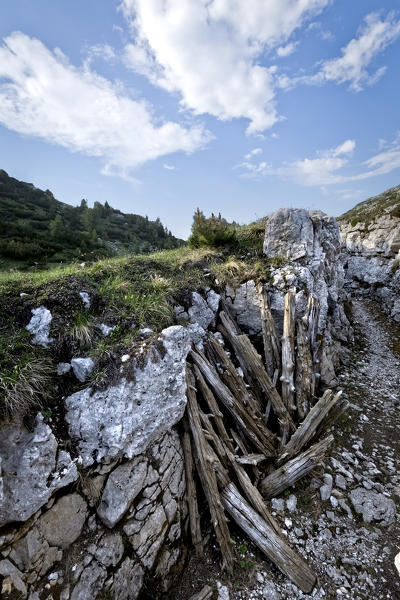 Italian trench of the Great War at Pozzo della Scala. Today it is part of the monumental area of mount Ortigara. Asiago plateau, Vicenza province, Veneto, Italy, Europe.