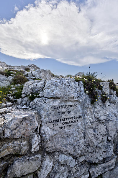 Italian plaque of the Great War at Cima della Caldiera. Today it is part of the monumental area of mount Ortigara. Asiago plateau, Vicenza province, Veneto, Italy, Europe.