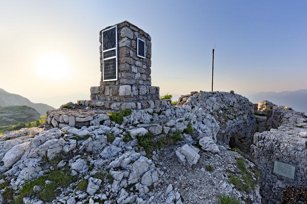 Mount Ortigara: the memorial stone and the Austro-Hungarian trenches of the Great War. Asiago plateau, Vicenza province, Veneto, Italy, Europe.