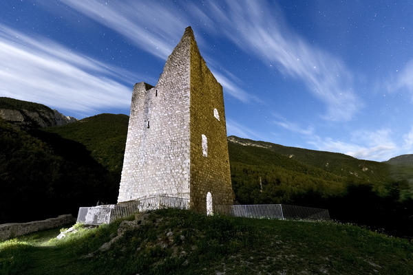 The keep of the Sporo Rovina castle on a full moon night. Sporminore, Non Valley, Trento province, Trentino Alto-Adige, Italy, Europe.