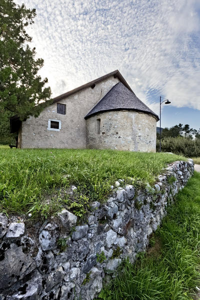 The ancient medieval church of Saints Filippo and Giacomo in Segonzone. Campodenno, Trento province, Trentino Alto-Adige, Italy, Europe. 