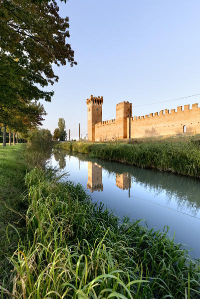 The Scaliger castle of Villimpenta and the stream Tione. Villimpenta, Mantova province, Lombardy, Italy, Europe.