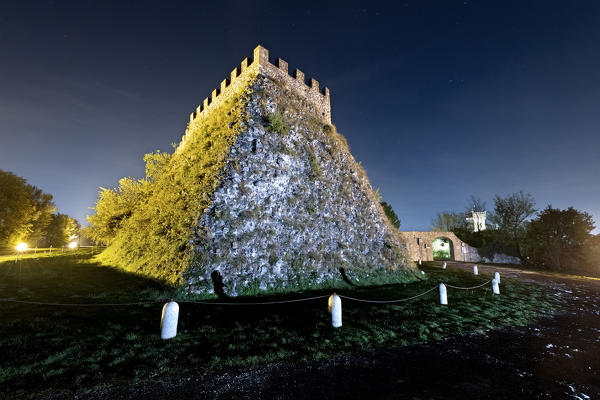 Night falls on the crenellated tower of the Lonato castle. Lonato, Brescia province, Lombardy, Italy, Europe.