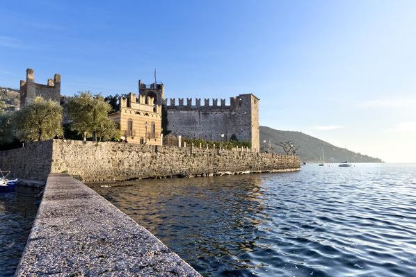 The Scaliger Castle (today it is the ethnographic museum of Lake Garda) in Torri del Benaco and the Lake Garda. Verona province, Veneto, Italy, Europe.