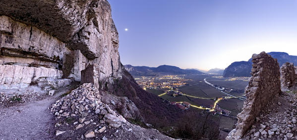 Twilight on the medieval ruins of the San Gottardo castle and on the Rotaliana plain. Mezzocorona, Trento province, Trentino Alto-Adige, Italy, Europe.