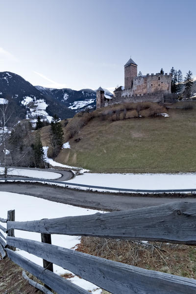 Reinegg castle and the fences of the alpine pastures. Sarentine Alps, Bolzano province, Trentino Alto-Adige, Italy, Europe.