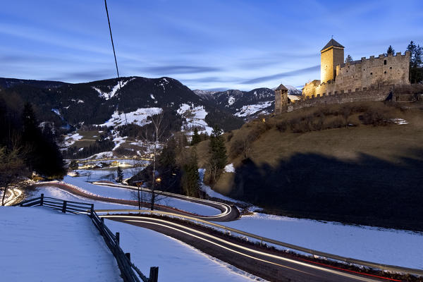 The imposing Reinegg castle and Sarentino valley. Bolzano province, Trentino Alto-Adige, Italy, Europe. 