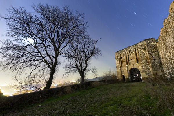 The ravelin (entrance) of Maltraverso Castle on a full moon night. Montebello Vicentino, Vicenza province, Veneto, Italy, Europe.