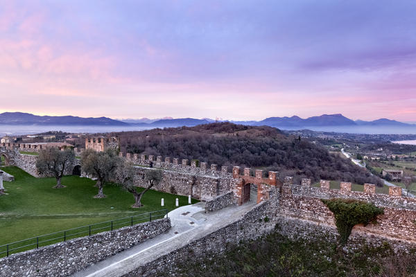 The Rocca di Lonato was built in the 10th century and today is managed by the Ugo da Como Foundation. In the background the pre-Alps of Brescia. Lonato del Garda, Brescia province, Lombardy, Italy, Europe.