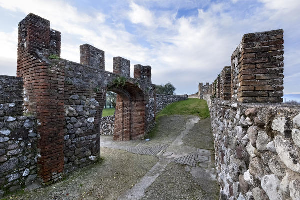 Portal in the crenellated walls of the Rocca (fortress) di Lonato. Lonato del Garda, Brescia province, Lombardy, Italy, Europe.