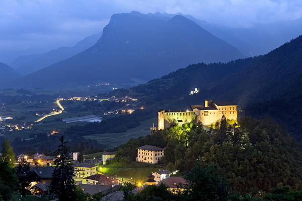 The castle and the village of Stenico. In the background the Lomaso plain. Giudicarie, Trento province, Trentino Alto-Adige, Italy, Europe.