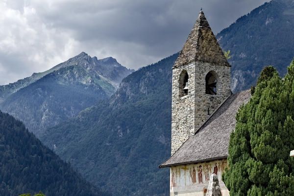 The San Vigilio church in Pinzolo and Cima Lancia in Presanella. Rendena Valley, Trento province, Trentino Alto-Adige, Italy, Europe.