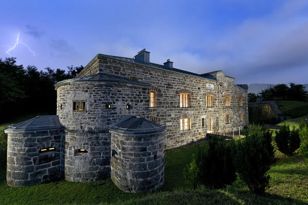 Stormy night at Fort Colle delle Benne. Levico Terme, Trento province, Trentino Alto-Adige, Italy, Europe.