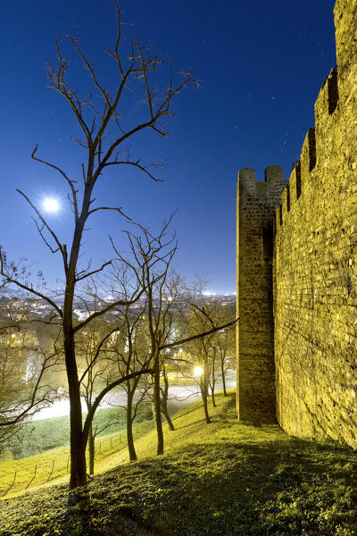 Full moon night on the medieval walls of the Carrarese castle in Este. Padova province, Veneto, Italy, Europe.