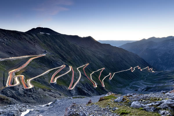 The Stelvio pass road at dawn. Trafoi valley, Bolzano province, Trentino Alto-Adige, Italy, Europe.