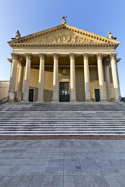 The facade of the cathedral of Cologna Veneta is an example of the neoclassical style. Verona province, Veneto, Italy, Europe.