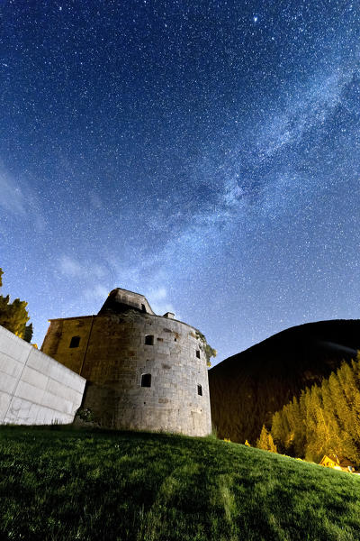 The Milky Way above the Hapsburg Fort of Gomagoi. Stelvio, Bolzano province, Trentino Alto-Adige, Italy, Europe.