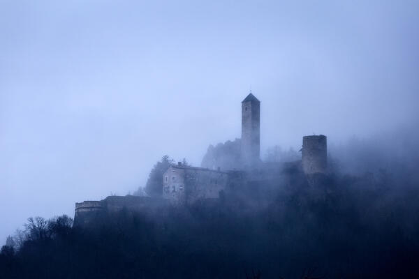 The ghostly Telvana castle is one of the most famous castles in Trentino. Borgo Valsugana, Trento province, Trentino Alto-Adige, Italy, Europe.