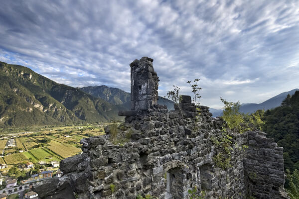 The crumbling walls of the Santa Barbara Castle were the home of the mighty Lodron dynasty. Lodrone, Giudicarie, Trento province, Trentino Alto-Adige, Italy, Europe. 