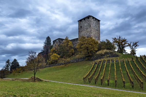 Mayenburg Castle towers on a hill on a cloudy autumn day. Foiana/Völlan, Lana, Bolzano province, Trentino Alto-Adige, Italy, Europe.