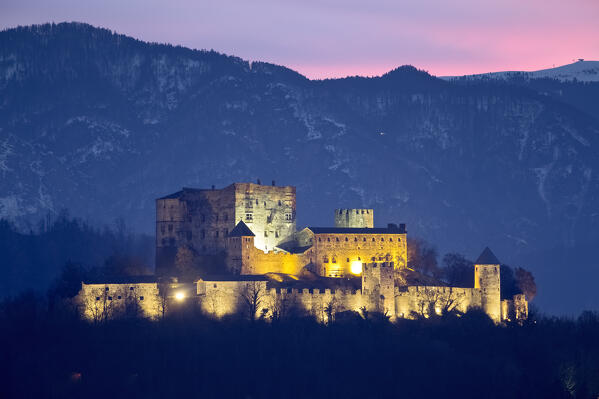 Winter sunset at Pergine castle. Pergine Valsugana, Trento province, Trentino Alto-Adige, Italy, Europe.
