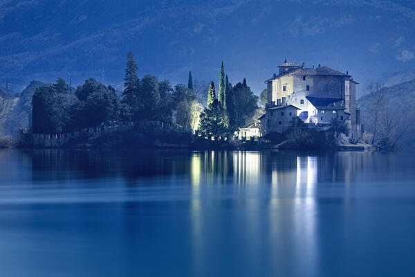 Toblino castle is surrounded by the waters of the lake and wrapped in ancient fairy tales. Madruzzo, Trento province, Trentino Alto-Adige, Italy, Europe.