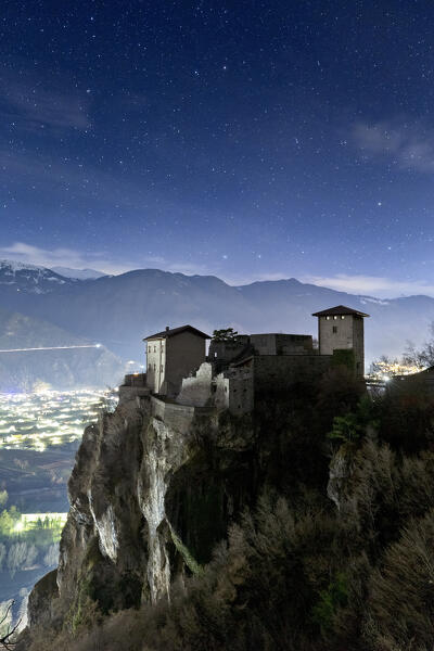 Starry night on San Giovanni Castle. Bondone, Giudicarie, Trento province, Trentino Alto-Adige, Italy, Europe.