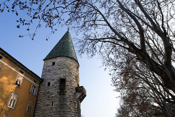 Trento: the Verde Tower is a medieval Gothic monument and takes its name from the color of its spire. Trentino Alto-Adige, Italy, Europe.