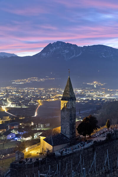 The medieval church of San Giorgio and the underlying town of Pergine Valsugana. In the background the Mount Becco di Filadonna. Serso, Trento province, Trentino Alto-Adige, Italy, Europe.