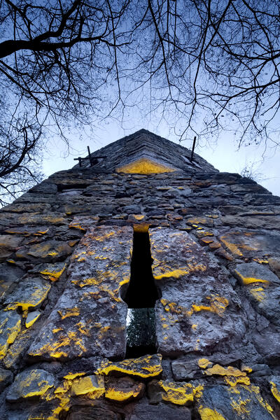 Trento: the imposing Goinghi tower is what remains of the Pietrapiana castle, home of the Belenzani dynasty. Povo, Trentino Alto-Adige, Italy, Europe.