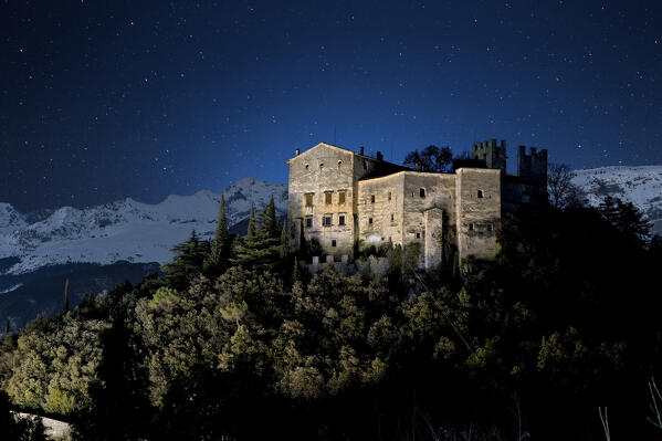 Spooky night at Madruzzo Castle: one of the most famous medieval buildings in Trentino and surrounded by fairy tales and legends. Madruzzo, Trento province, Trentino Alto-Adige, Italy, Europe.