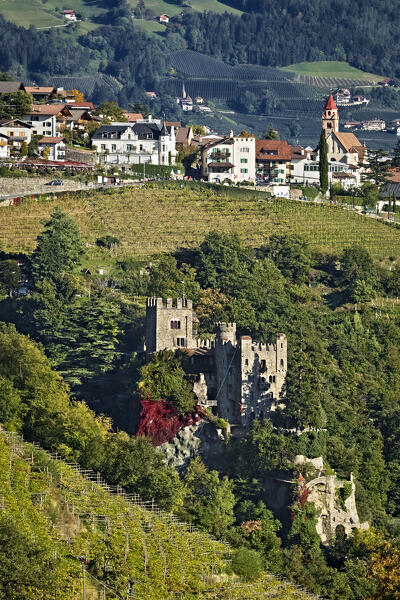 The village of Tirol/Tirolo, which gave its name to the entire Alpine area, and the Brunnenburg/ Fontana Castle. Bolzano province, Trentino Alto-Adige, Italy, Europe.