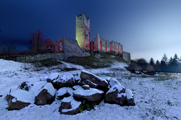 Spooky night in the ruins of Belfort Castle: according to medieval legend, the ghost of the knight Christopher Reifer roams here. Trento province, Trentino Alto-Adige, Italy, Europe.