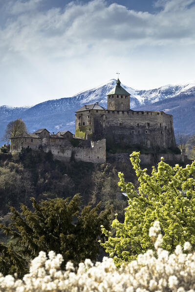 The medieval fortress of Ivano castle overlooks the rural landscape of Valsugana. Castel Ivano, Trento province, Trentino Alto-Adige, Italy, Europe.