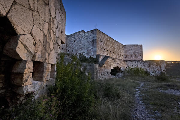 The nineteenth-century casemates of Fort Mollinary on a full moon night. Monte, Valpolicella, Verona province, Veneto, Italy.