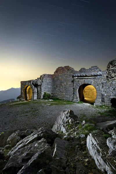 The entrances of the gigantic tunnel of Fort Campomolon in the middle of the night. Arsiero, Veneto, Italy.