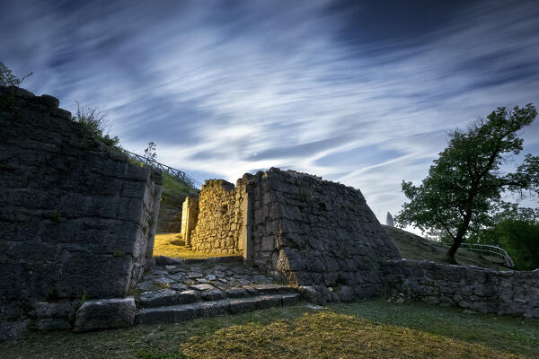 Monumental entrance to the medieval ruins of Nomi Castle. Vallagarina, Trentino, Italy.