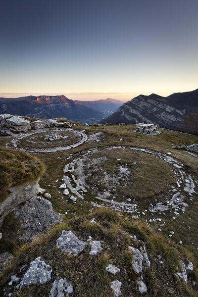 Vestiges of the Italian fortifications of the Great War at the Corno della Paura. In the background the Lessinia. Brentonico, Trentino, Italy.