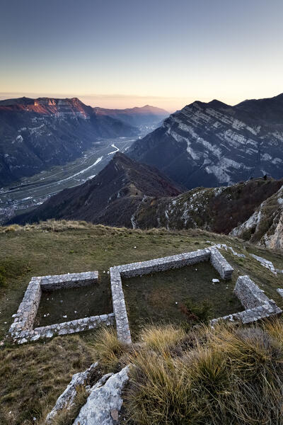 Vestiges of the Italian fortifications of the Great War at the Corno della Paura. In the background the Lessinia. Brentonico, Trentino, Italy.