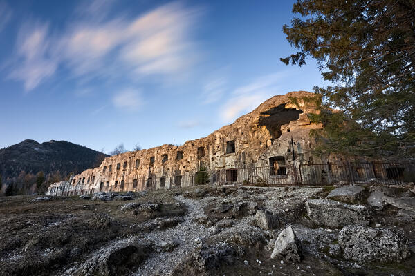 Fort Busa Verle: sunset over the ruins of the Habsburg fortress of the Great War. Vezzena, Levico Terme, Trentino, Italy.