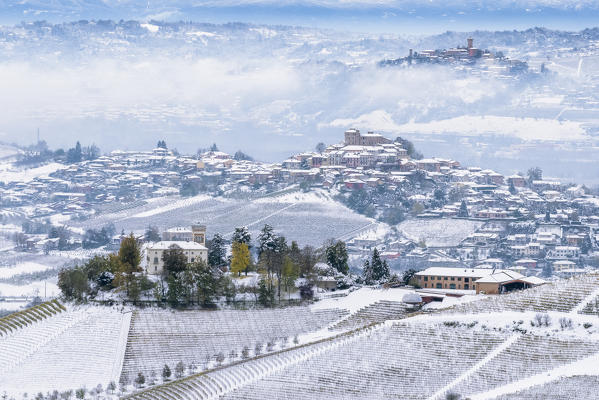 Snow on the three hills of Ceretto Wine, Roddi and Santa Vittoria d'Alba from Diano d'Alba, Piedmont, Italy