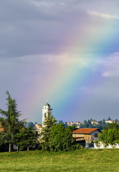 Rainbow over San Colombano's Chapel in Belvedere Langhe, Piedmont, Italy