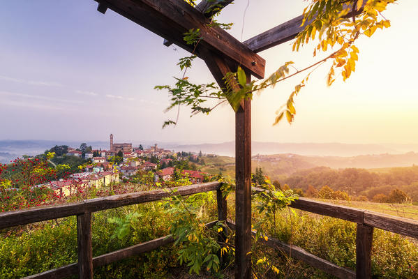 Viewpoint of Castiglione Tinella during the sunrise from a gazebo, Castiglione Tinella, Piedmont, Italy