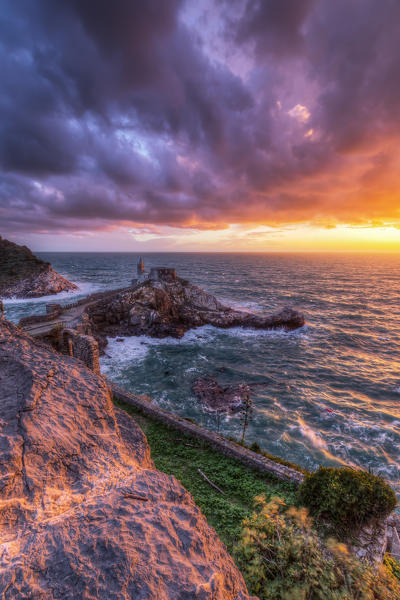 Storm at sunset on the Church of San Pietro, Unesco World Heritage Site, municipality of Porto Venere, La Spezia province, Liguria district, Italy, Europe